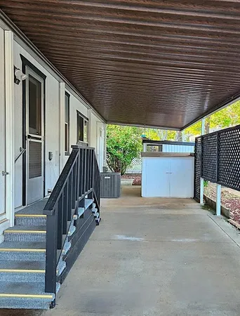 a view of backyard with green space
