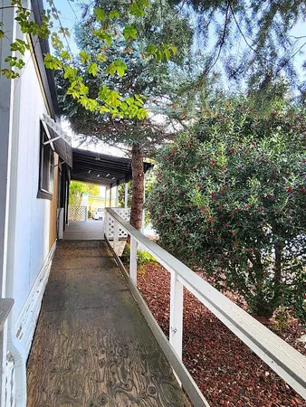 a view of a backyard of the house