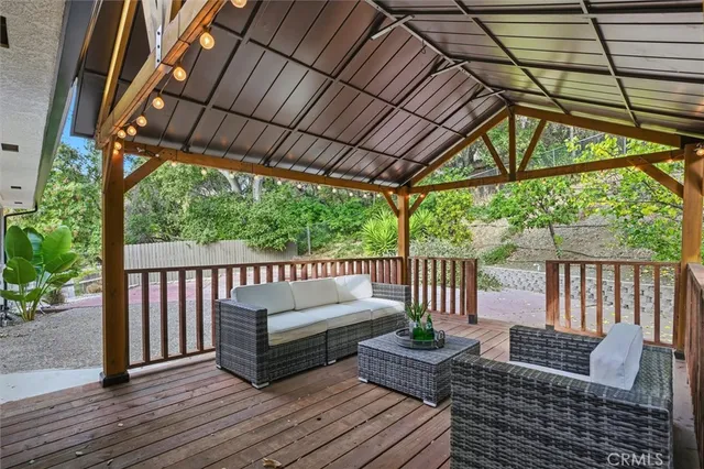 a view of porch with a bench