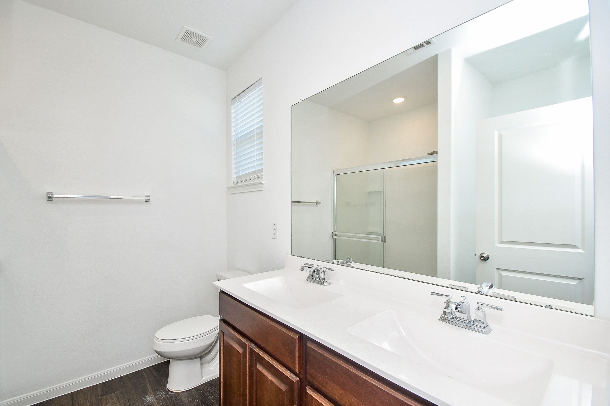 17826 Juneberry Seed Street Hockley, TX 77447 - Photo 22 of 35 a bathroom with a sink toilet and mirror
