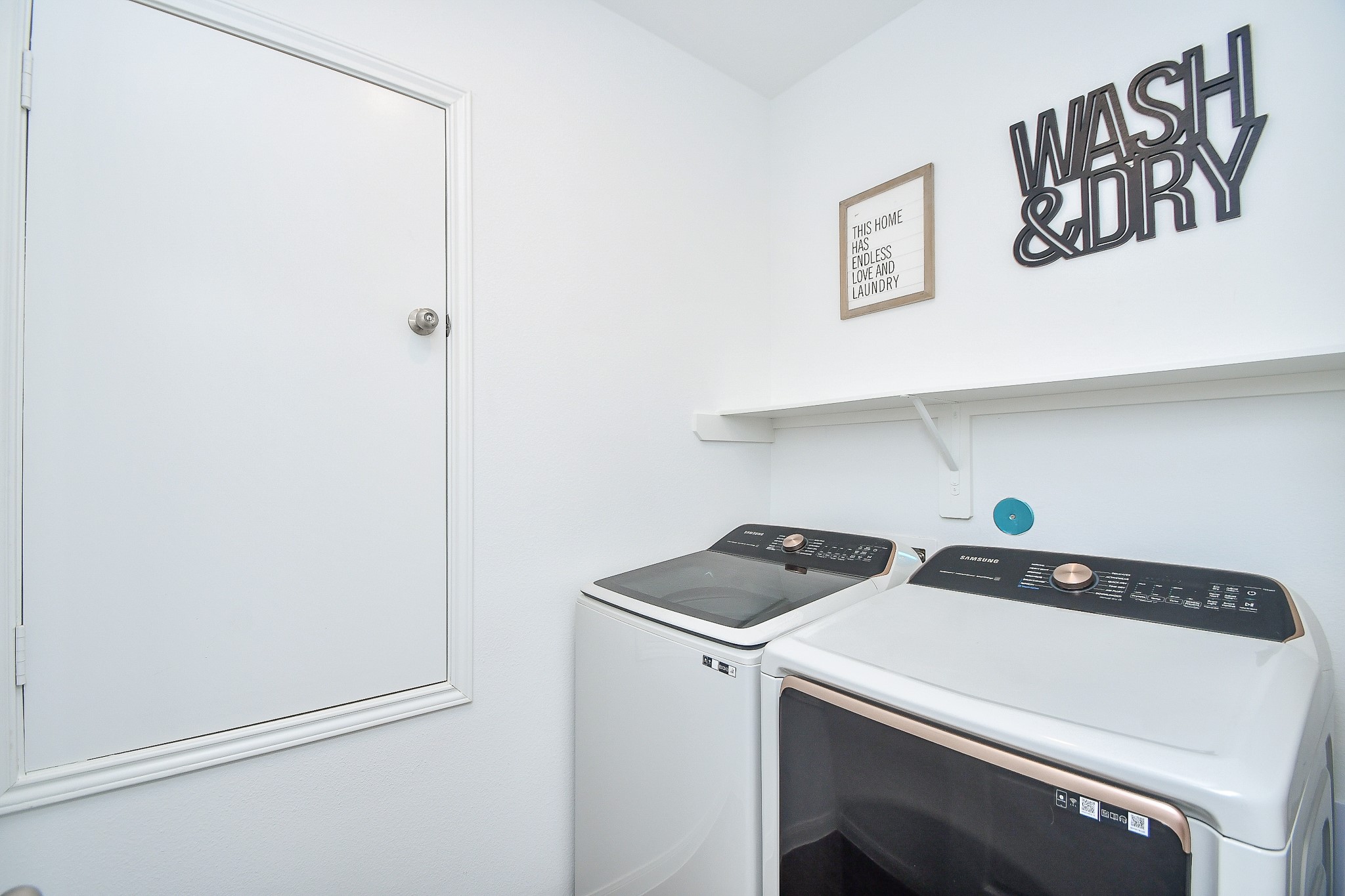 17826 Juneberry Seed Street Hockley, TX 77447 - Photo 28 of 35 a utility room with dryer and washer