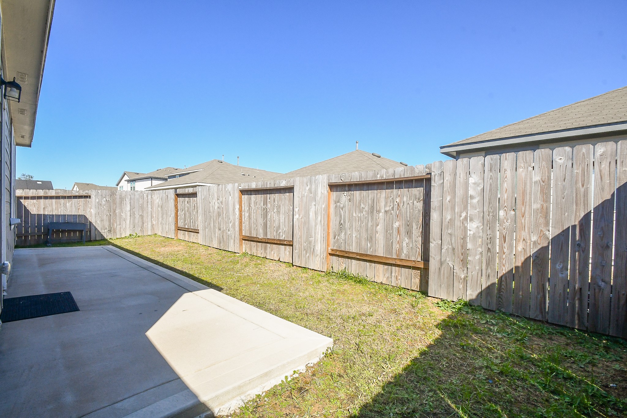 17826 Juneberry Seed Street Hockley, TX 77447 - Photo 29 of 35 a view of a house with wooden floor and a yard