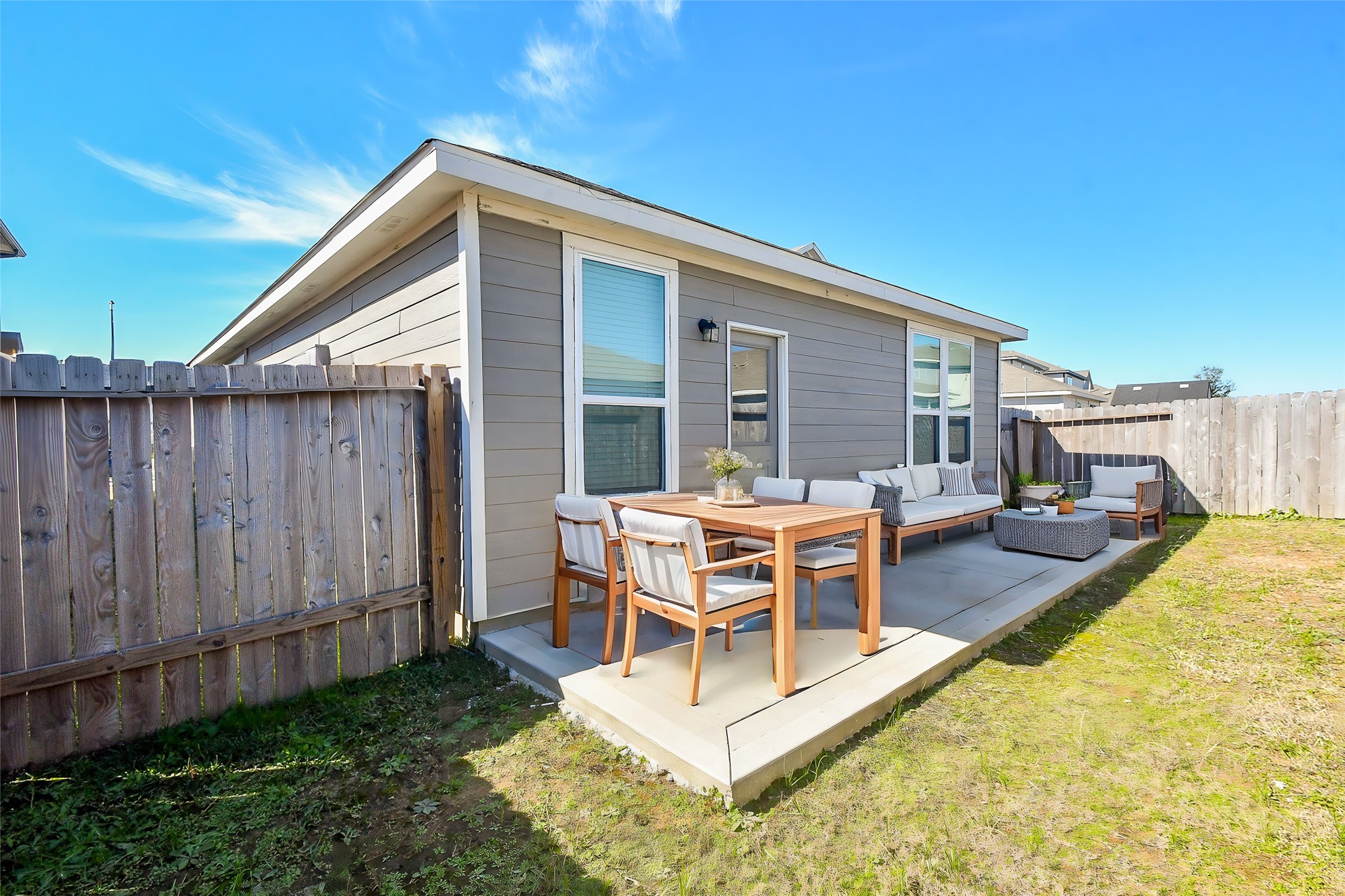 17826 Juneberry Seed Street Hockley, TX 77447 - Photo 32 of 35 a view of a house with backyard and sitting area