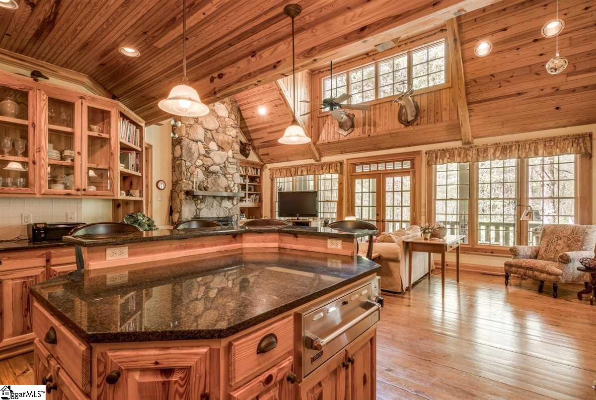 185 Hemlock Cove Road Sunset, SC 29685 - Photo 2 of 36 Kitchen duty is like play time when you can stay connected with everyone in the Great Room and enjoy the view too.