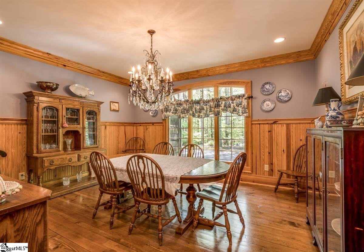185 Hemlock Cove Road Sunset, SC 29685 - Photo 12 of 36 Huge dining room allows for large gatherings. Lots of custom woodwork sets the tone for a special setting.