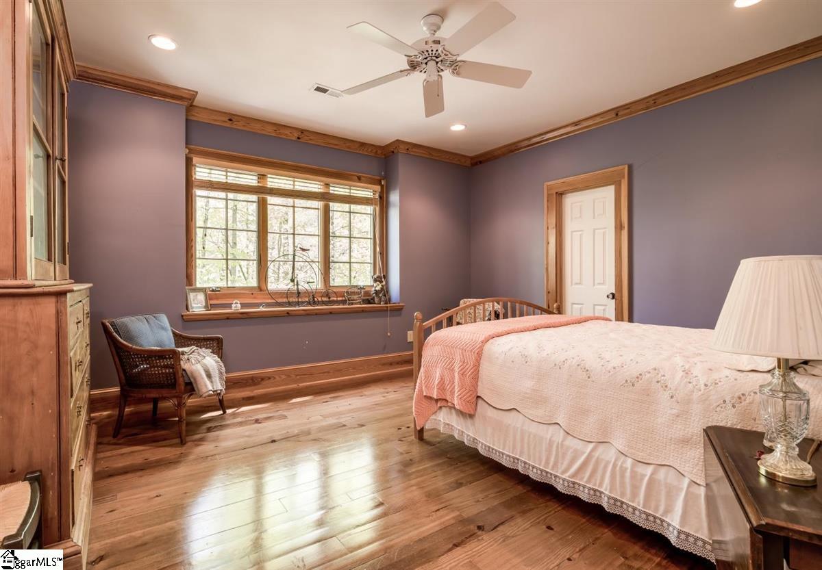 185 Hemlock Cove Road Sunset, SC 29685 - Photo 22 of 36 Guest bedroom with large window to enjoy the private surroundings.
