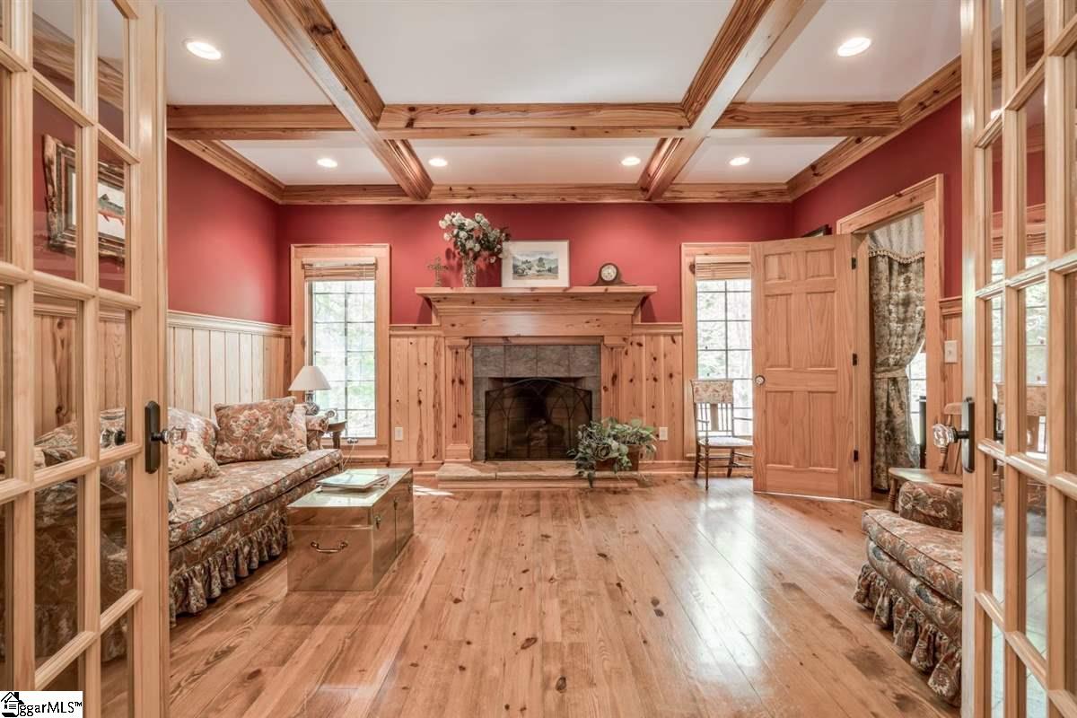 185 Hemlock Cove Road Sunset, SC 29685 - Photo 4 of 36 Library to enjoy a quiet moment and a warm fire. Notice the attention to the woodwork on the ceiling. Door on the right leads to the Master Bedroom suite.