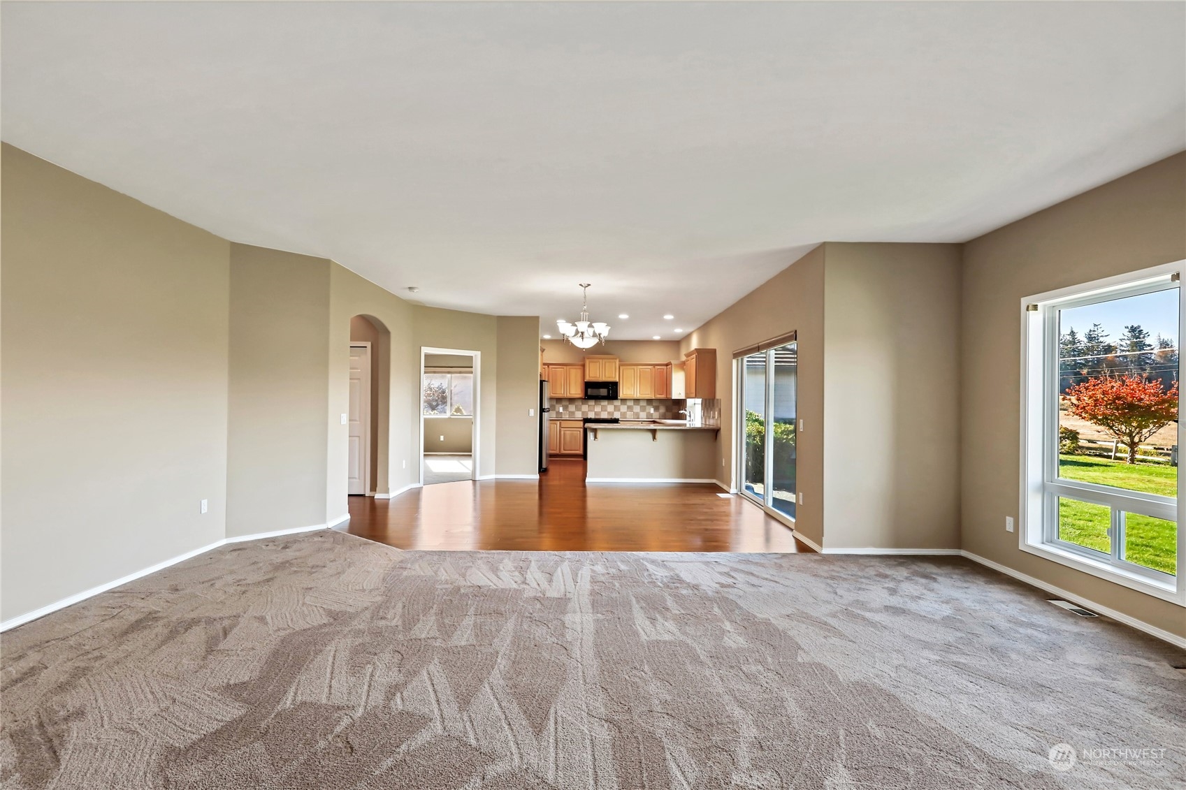 80 Cascadia Loop Sequim, WA 98382 - Photo 6 of 40 a view of empty room with wooden floor and window