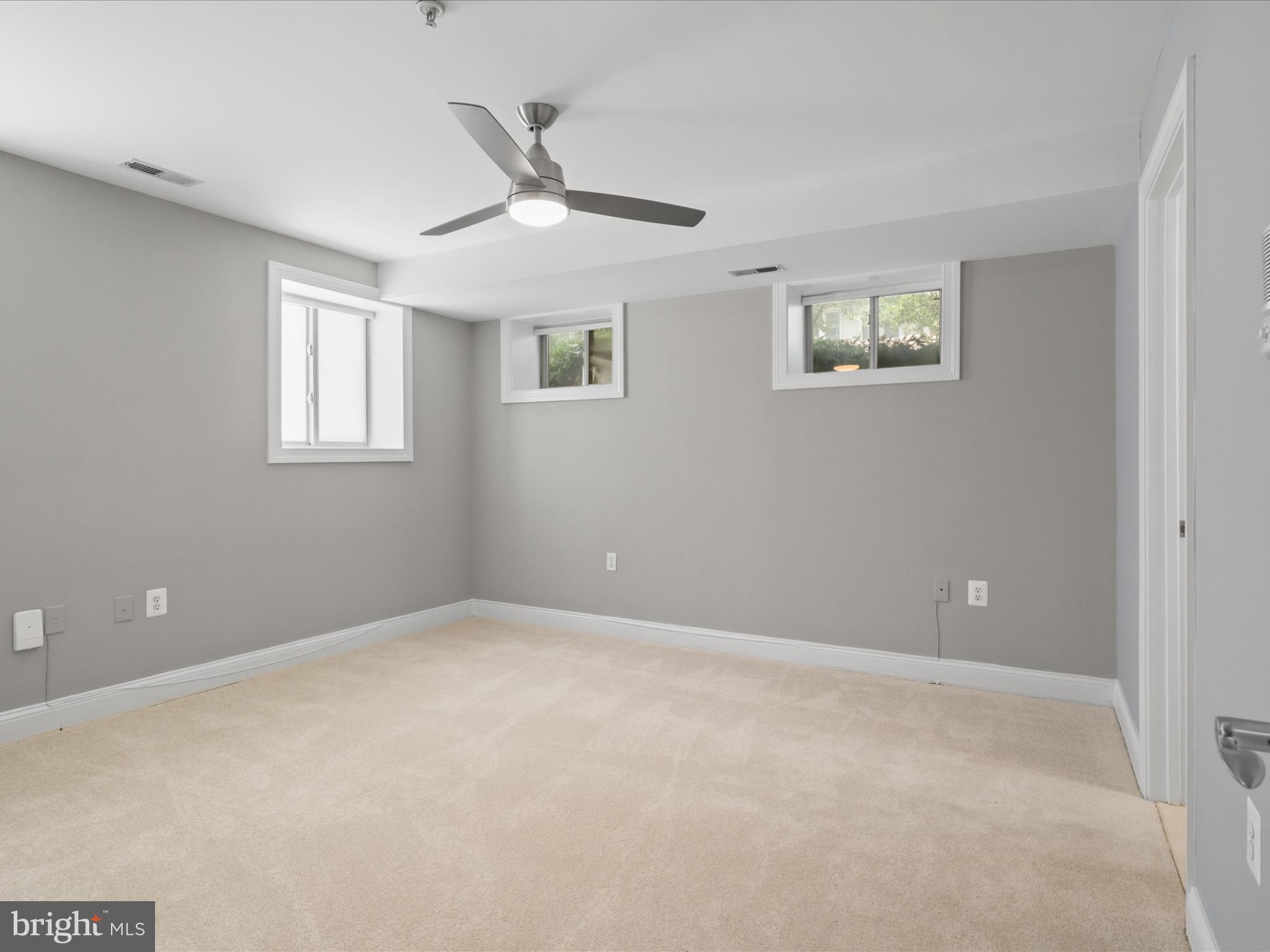 1300 Taylor Street Northwest, Unit 4 Washington, DC 20011 - Photo 16 of 35 a view of an empty room with a window