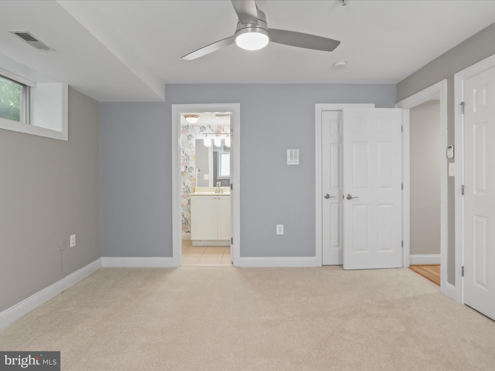 1300 Taylor Street Northwest, Unit 4 Washington, DC 20011 - Photo 18 of 35 a view of an empty room and chandelier fan