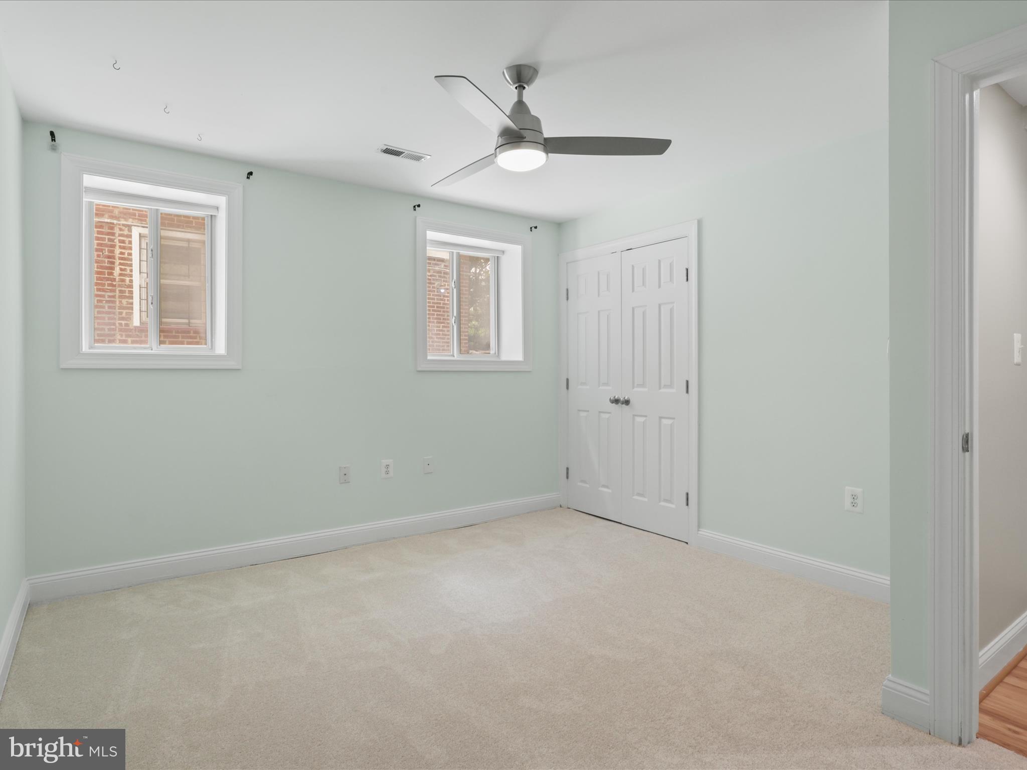 1300 Taylor Street Northwest, Unit 4 Washington, DC 20011 - Photo 22 of 35 a view of an empty room with a window