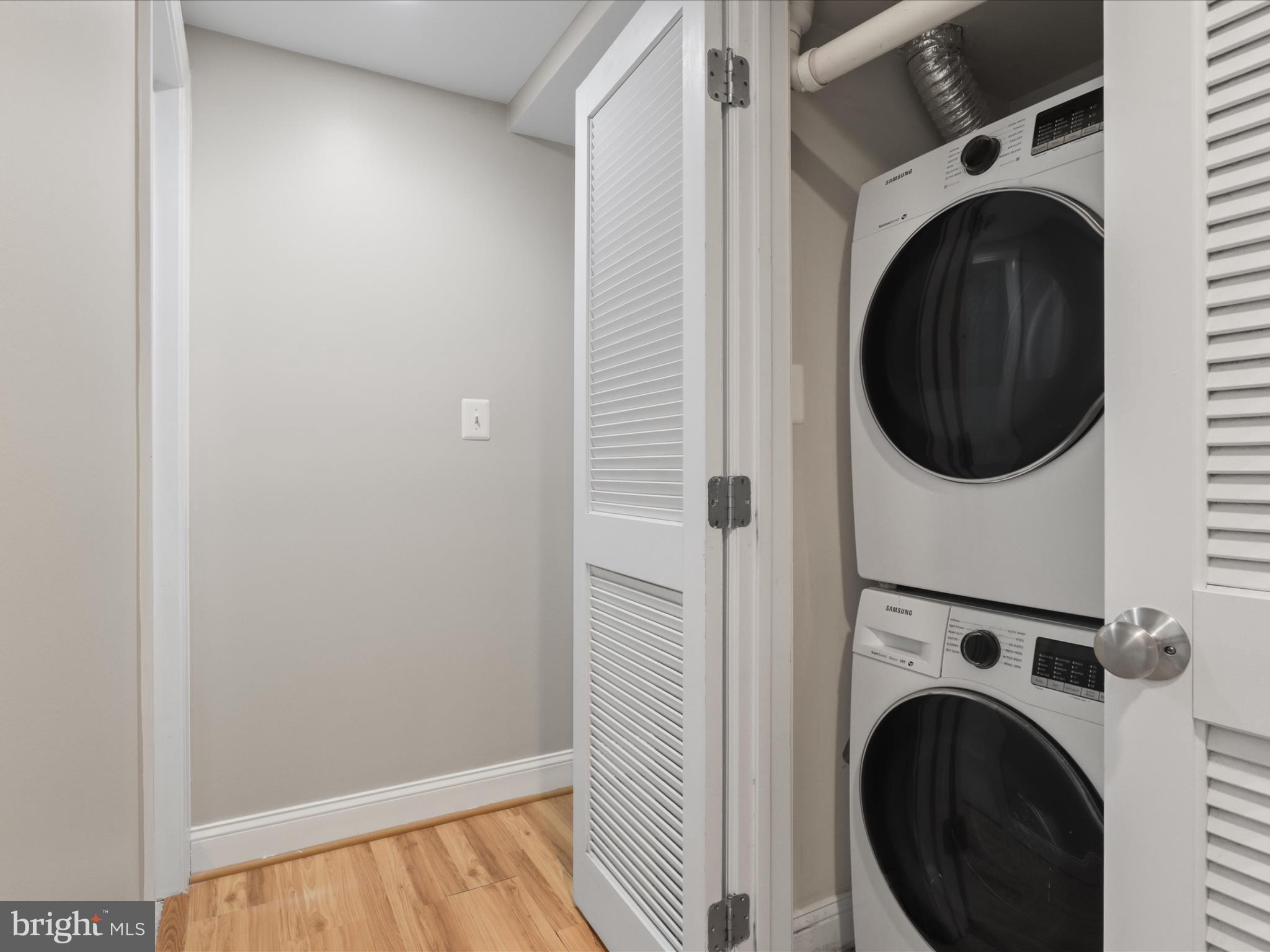 1300 Taylor Street Northwest, Unit 4 Washington, DC 20011 - Photo 25 of 35 a view of a hallway with washer and dryer