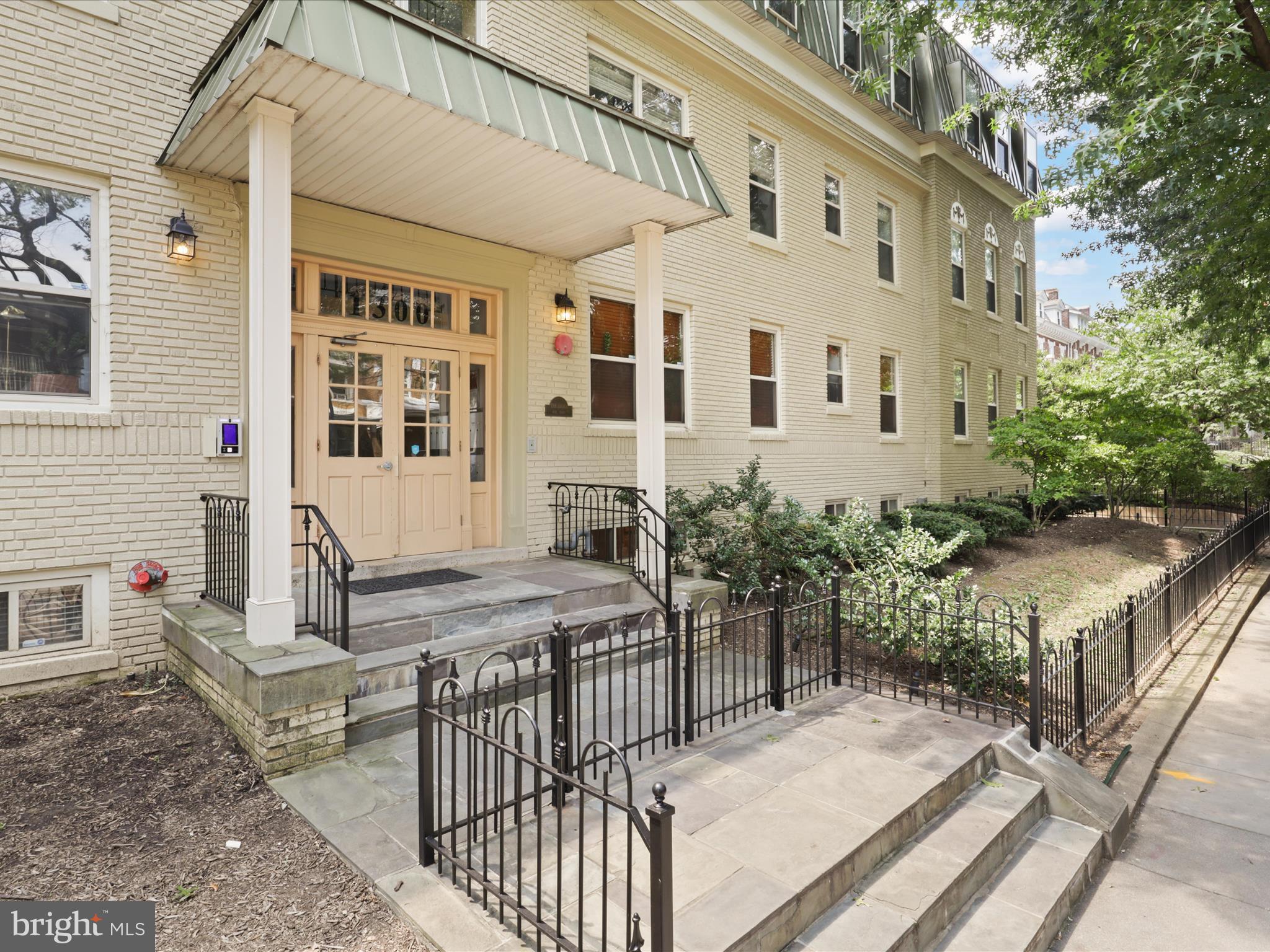 1300 Taylor Street Northwest, Unit 4 Washington, DC 20011 - Photo 3 of 35 a view of a house with backyard and sitting area