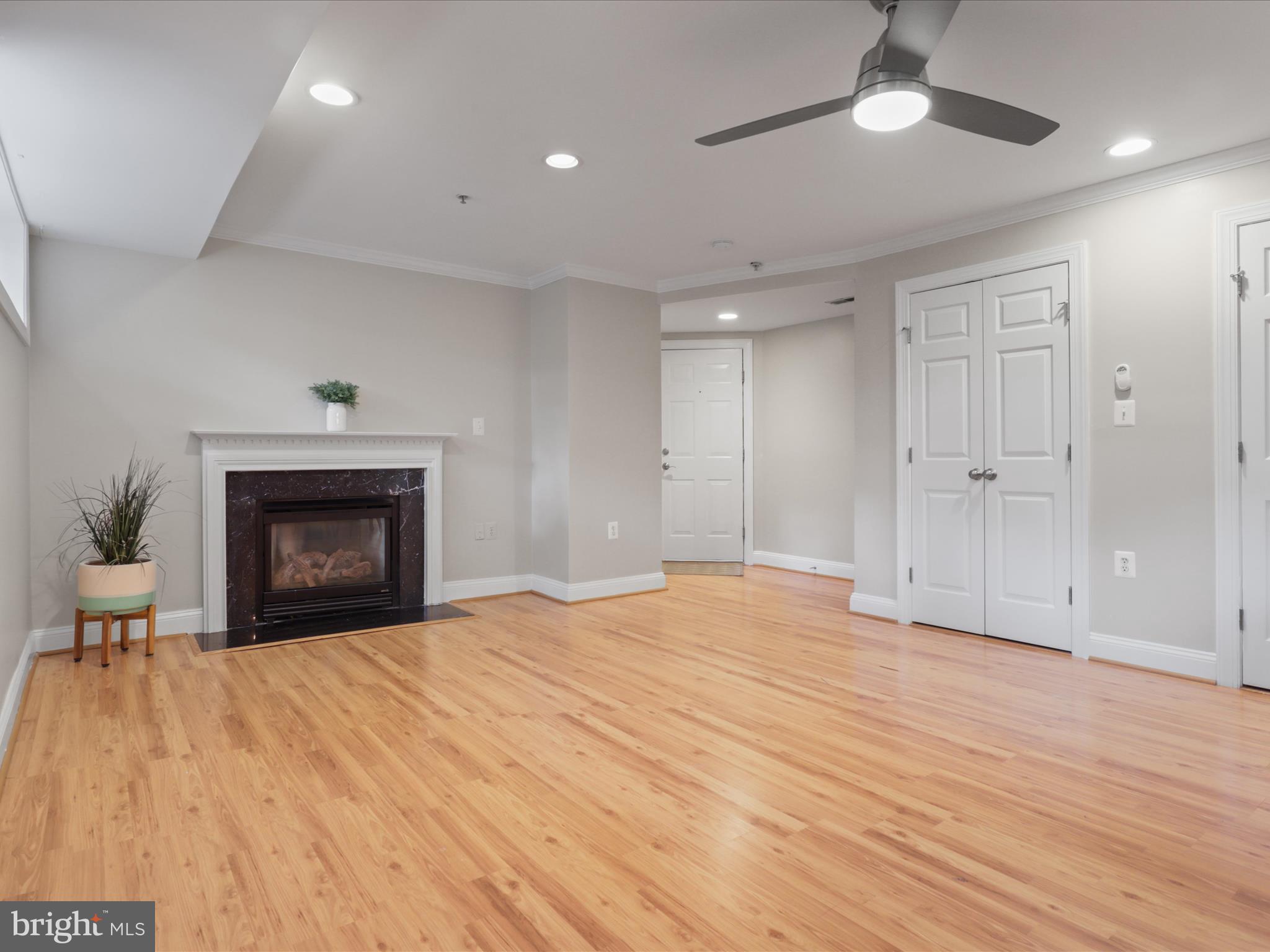 1300 Taylor Street Northwest, Unit 4 Washington, DC 20011 - Photo 6 of 35 a view of an empty room with a fireplace