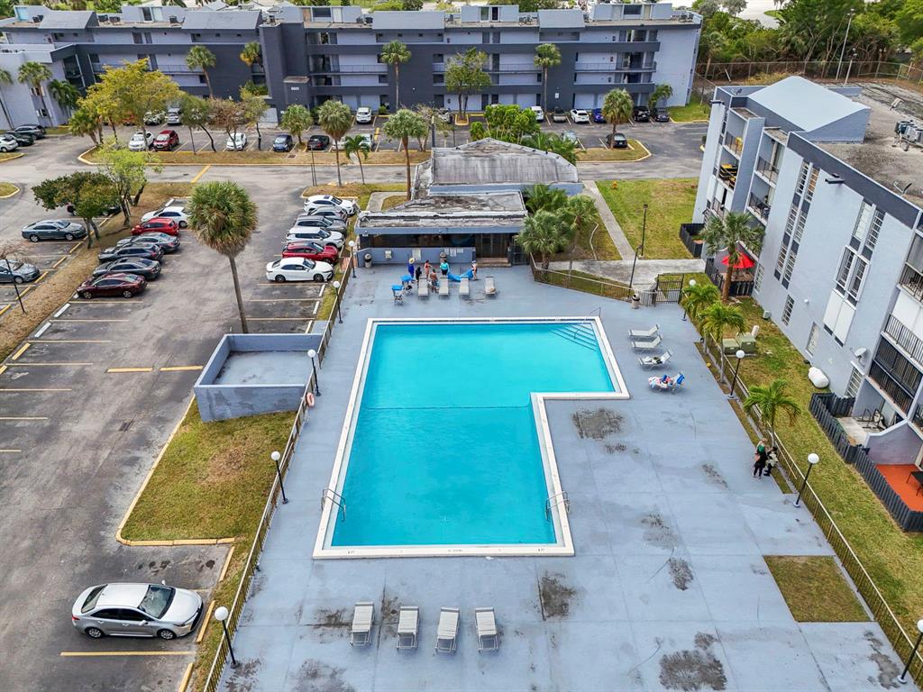 310 Fontainebleau Boulevard, Unit 502 Miami, FL 33172 - Photo 17 of 24 a view of swimming pool with a patio