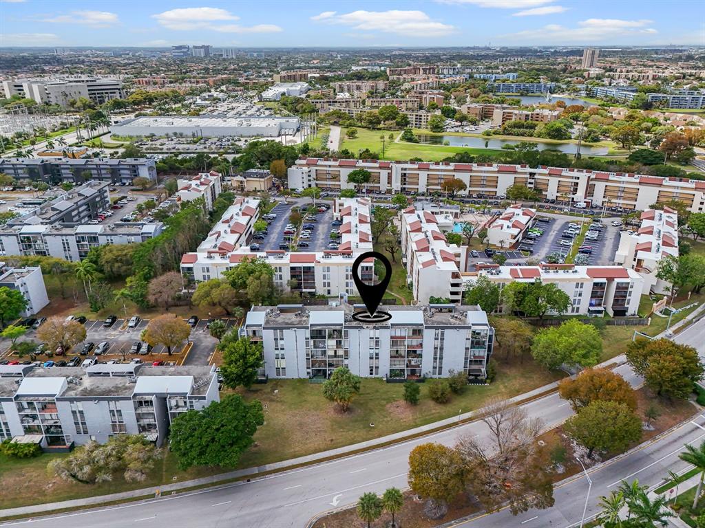 310 Fontainebleau Boulevard, Unit 502 Miami, FL 33172 - Photo 23 of 24 an aerial view of a city with lots of residential buildings