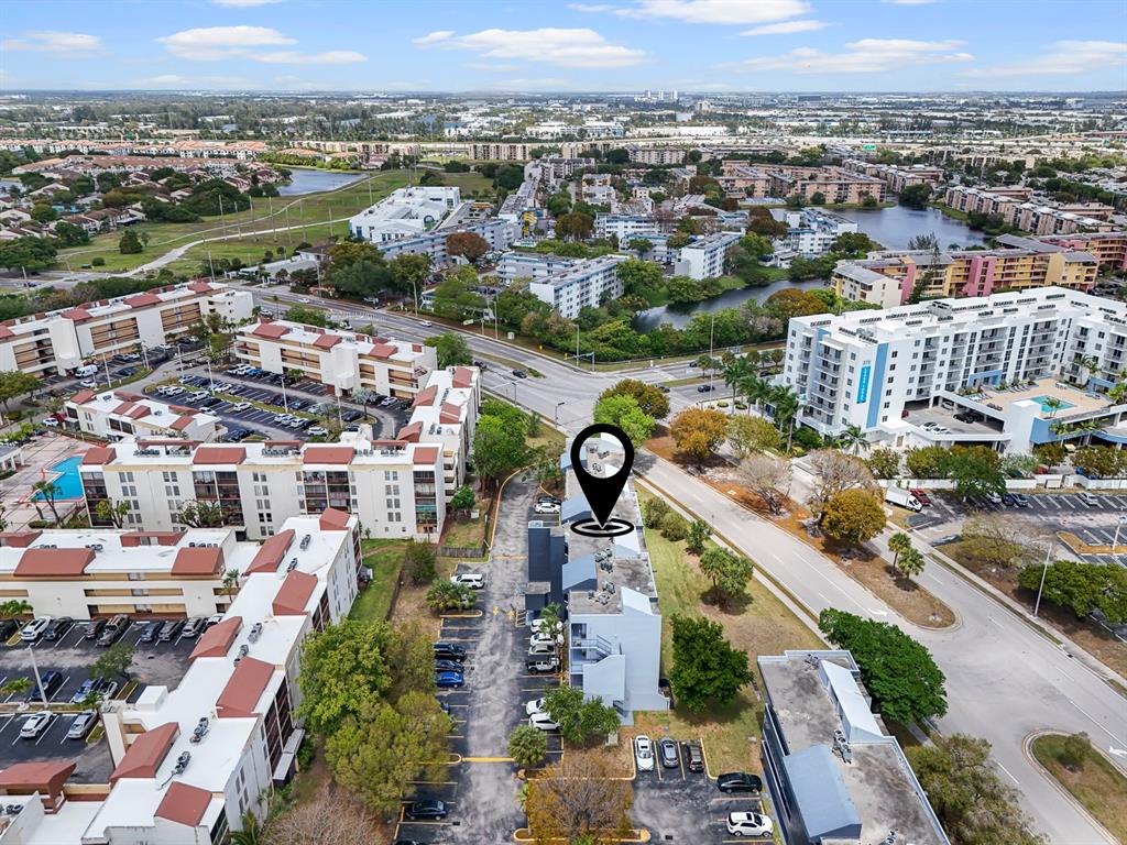 310 Fontainebleau Boulevard, Unit 502 Miami, FL 33172 - Photo 24 of 24 an aerial view of a city with lots of residential buildings