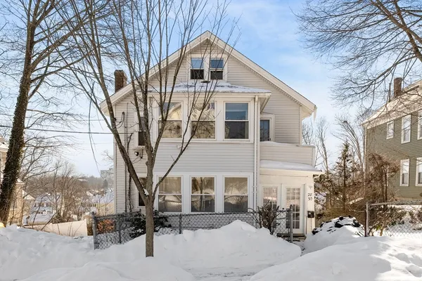 a big white house with a large windows