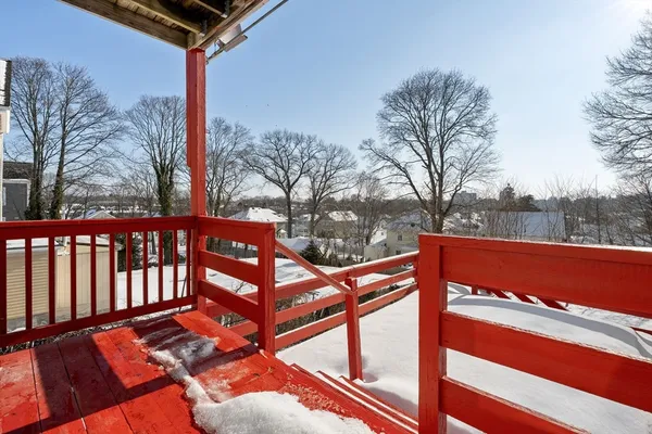 a view of a bench in a backyard
