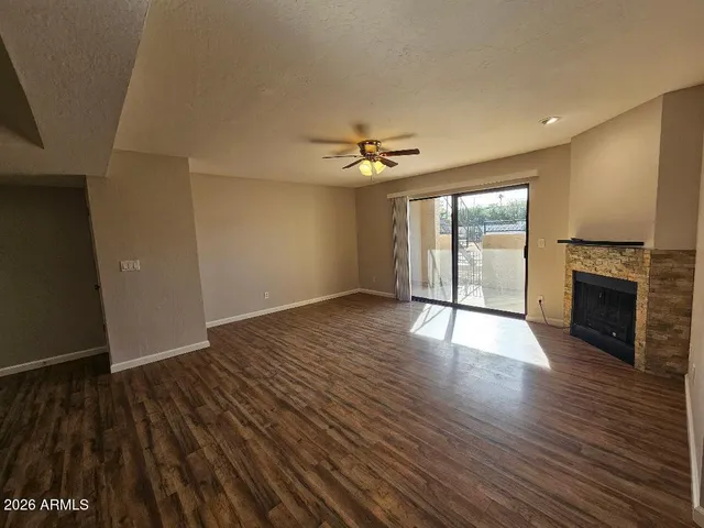 a view of a livingroom with a fireplace