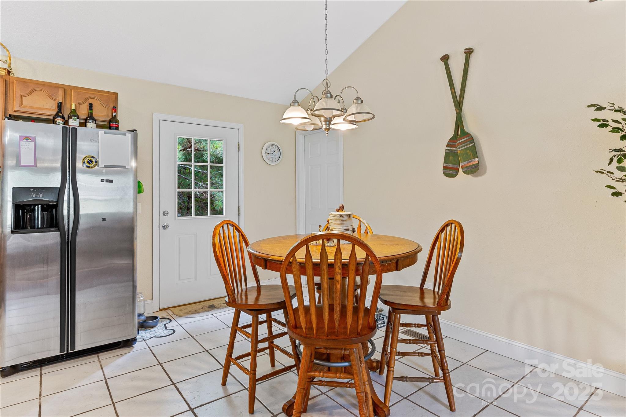 410 Lewis Road Rutherfordton, NC 28139 - Photo 11 of 23 a view of a dining room with furniture and chandelier