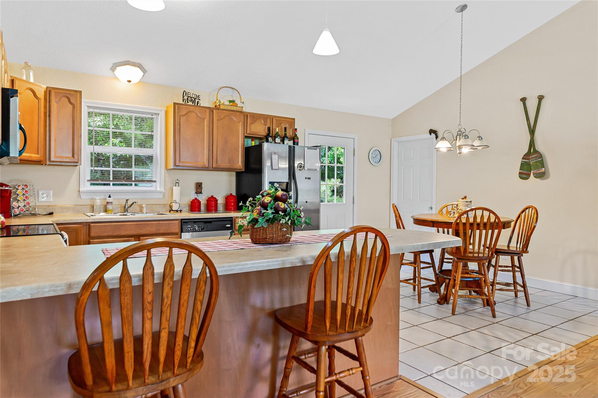 410 Lewis Road Rutherfordton, NC 28139 - Photo 12 of 23 a view of a dining room with furniture and chandelier