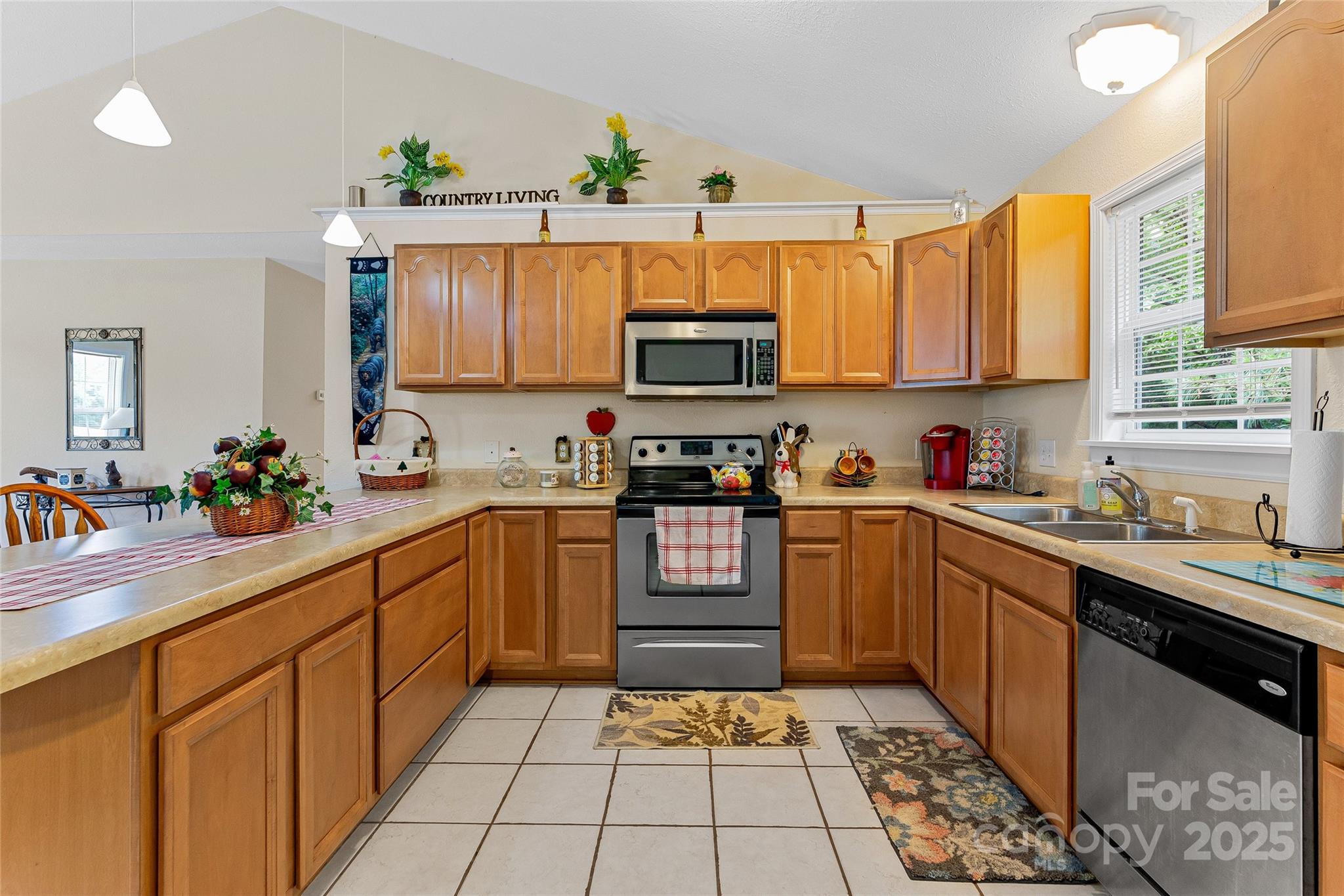410 Lewis Road Rutherfordton, NC 28139 - Photo 13 of 23 a kitchen with granite countertop a sink stove and cabinets