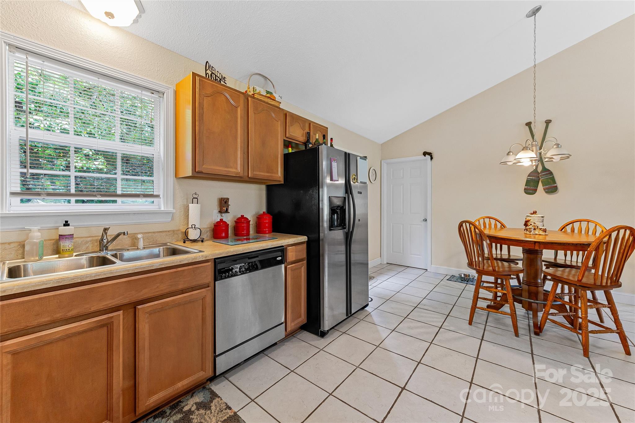 410 Lewis Road Rutherfordton, NC 28139 - Photo 15 of 23 a kitchen with a sink cabinets and window