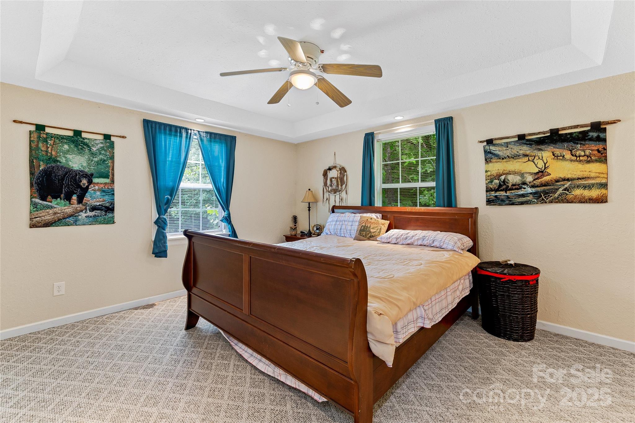 410 Lewis Road Rutherfordton, NC 28139 - Photo 16 of 23 a bed room with a bed and a painting on the wall