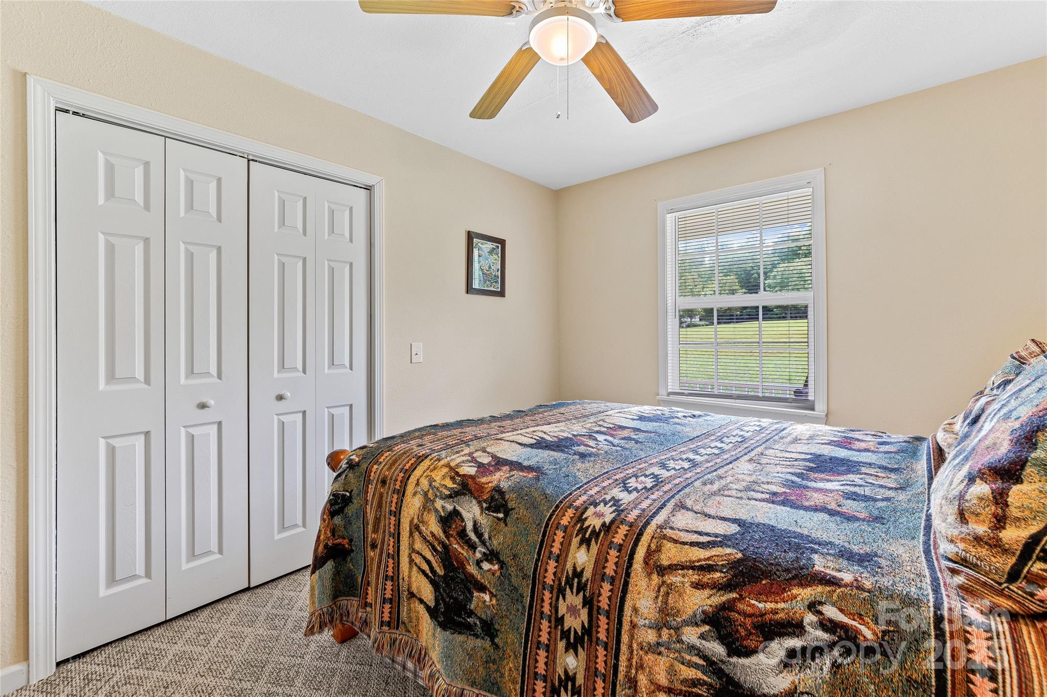 410 Lewis Road Rutherfordton, NC 28139 - Photo 19 of 23 a bedroom with a bed and a window