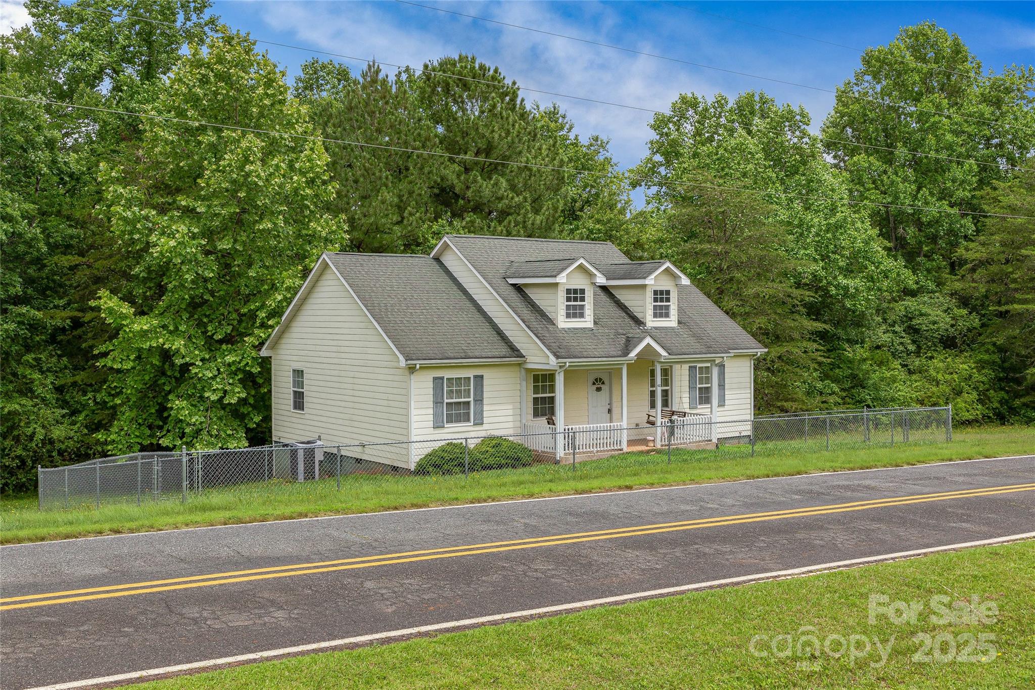 410 Lewis Road Rutherfordton, NC 28139 - Photo 4 of 23 a front view of a house with a garden