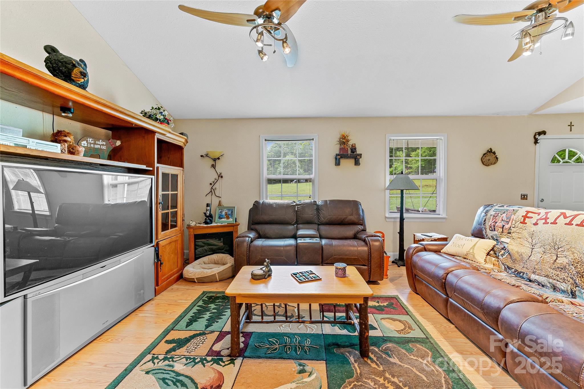 410 Lewis Road Rutherfordton, NC 28139 - Photo 7 of 23 a living room with furniture a rug and a window