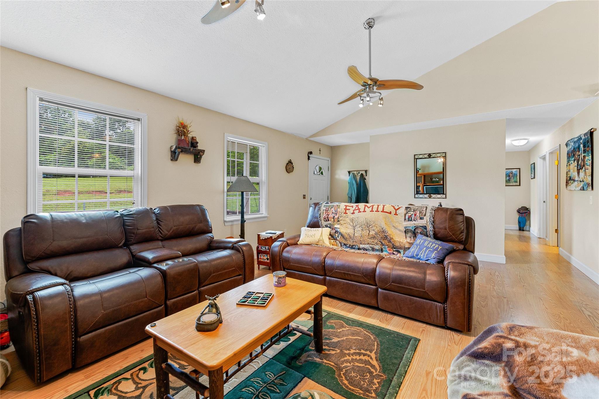410 Lewis Road Rutherfordton, NC 28139 - Photo 8 of 23 a living room with furniture a bed and a window