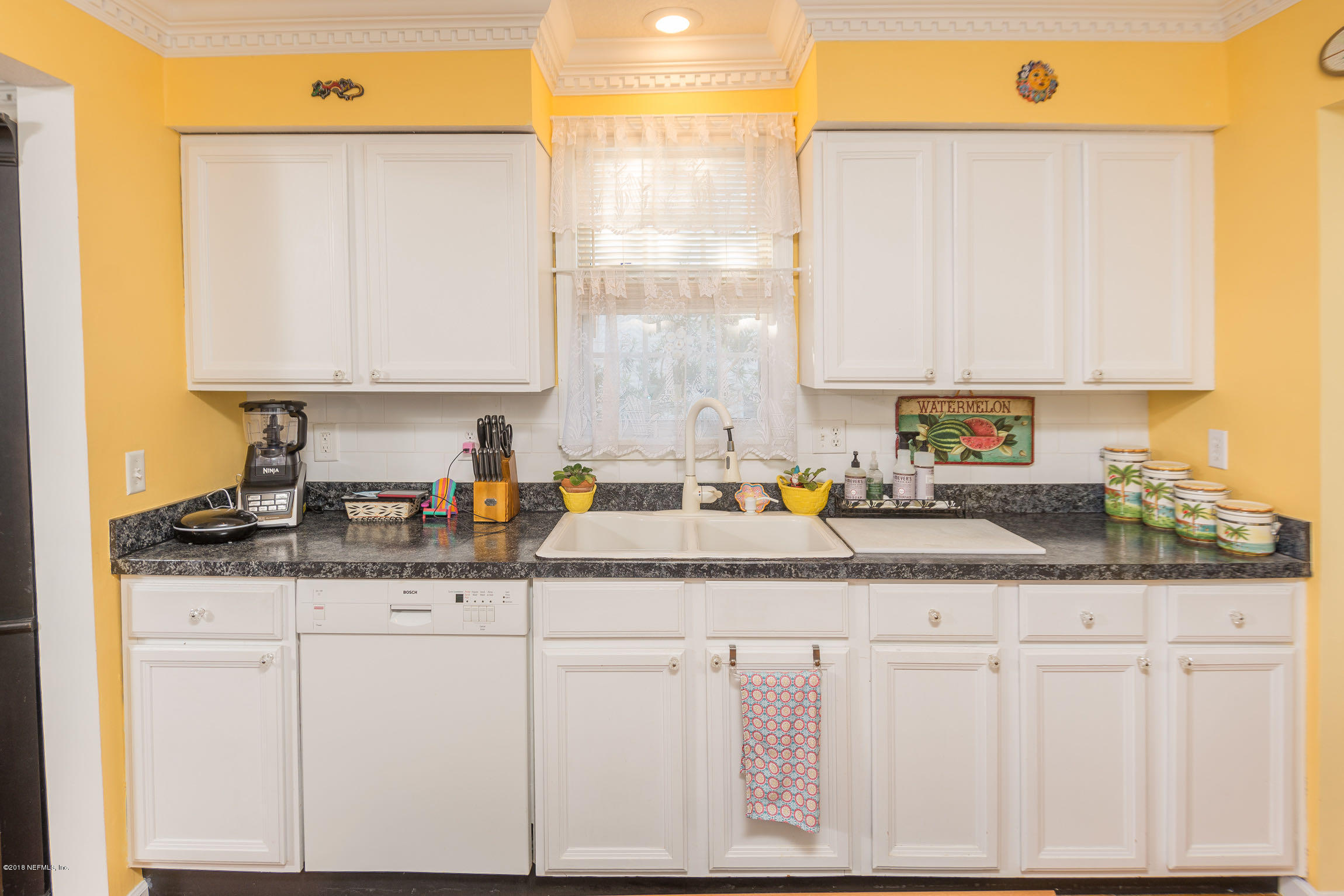 214 Hopkins Street Neptune Beach, FL 32266 - Photo 13 of 58 Kitchen with Crown Molding