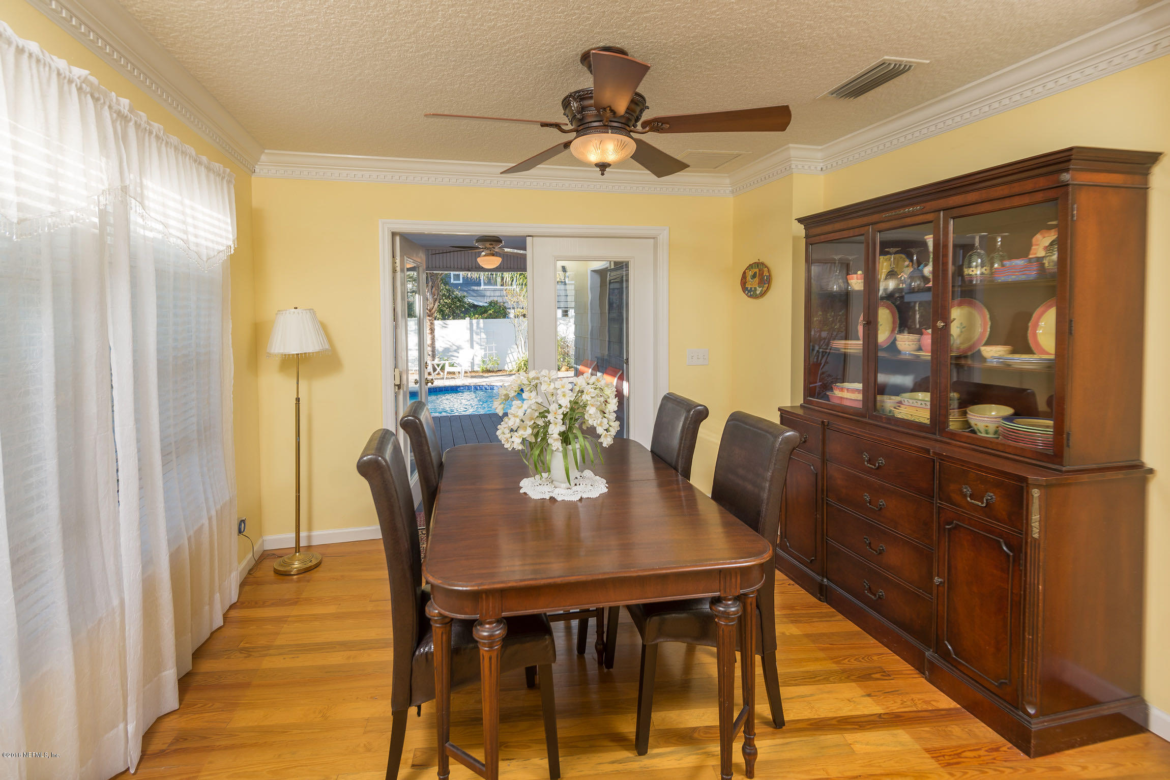 214 Hopkins Street Neptune Beach, FL 32266 - Photo 16 of 58 Dining Room Open to Pool Area