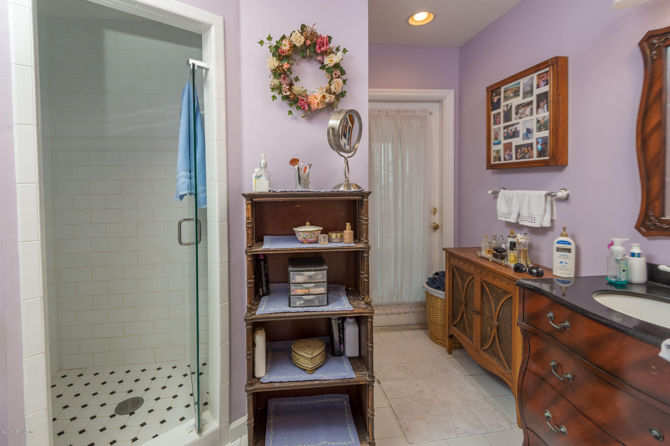 214 Hopkins Street Neptune Beach, FL 32266 - Photo 35 of 58 Bathroom Vanity, Shower and Door to Outd