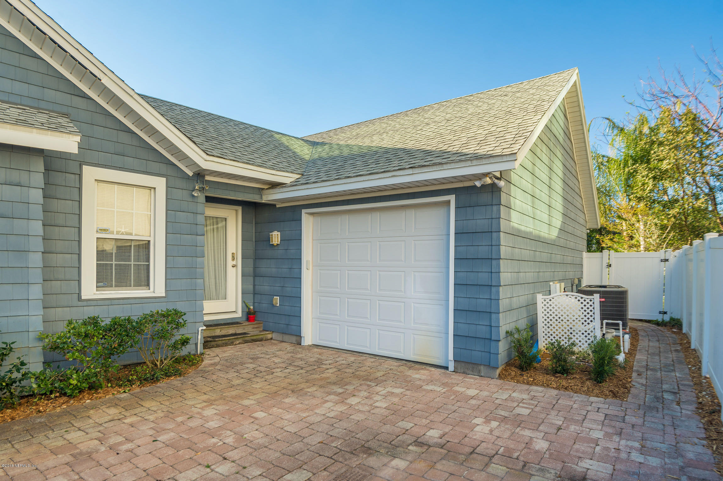 214 Hopkins Street Neptune Beach, FL 32266 - Photo 52 of 58 Side Entry and Gate to Back