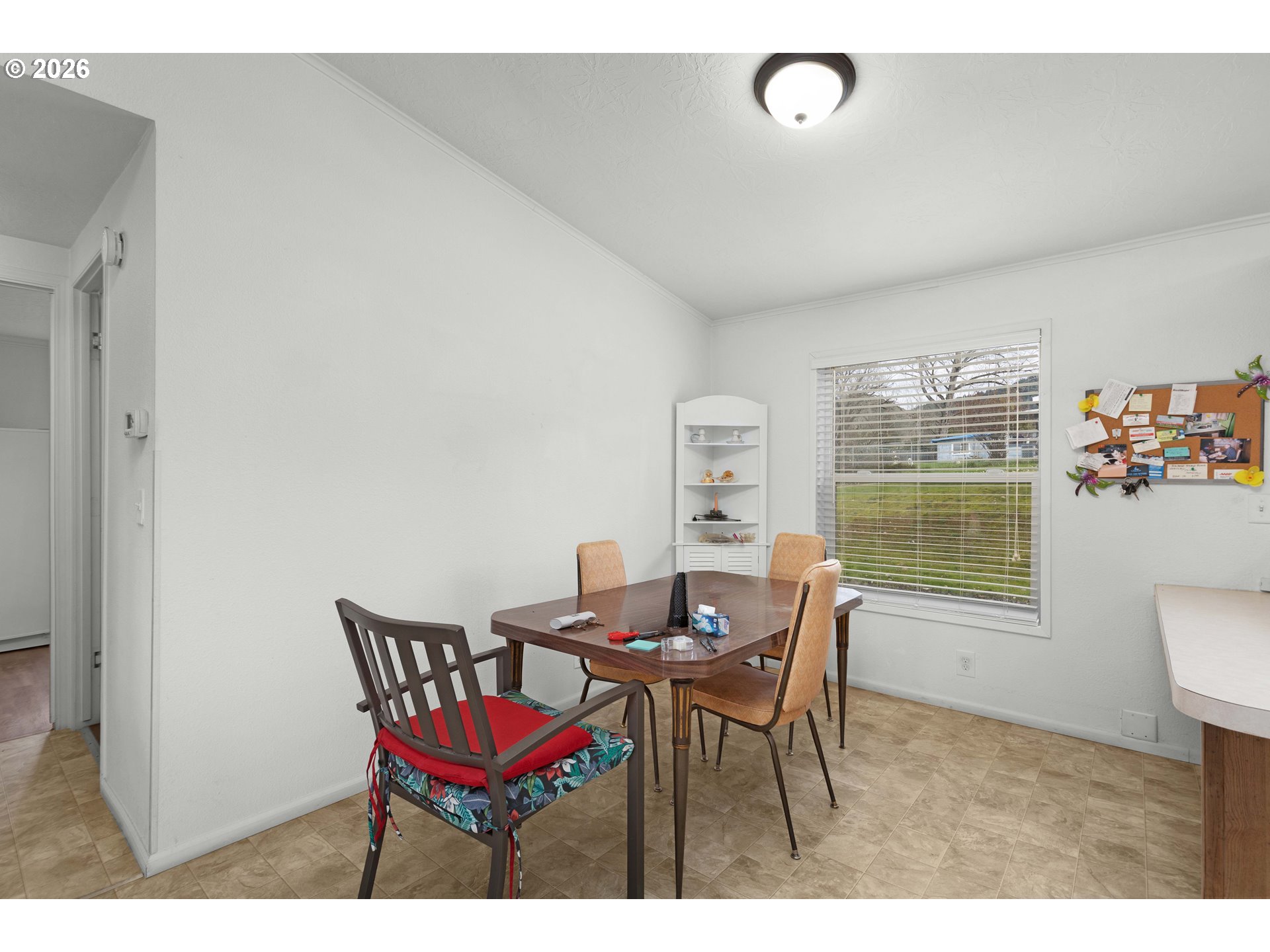 583 Suncrest Street Myrtle Creek, OR 97457 - Photo 12 of 24 a view of a dining room with furniture window and outside view