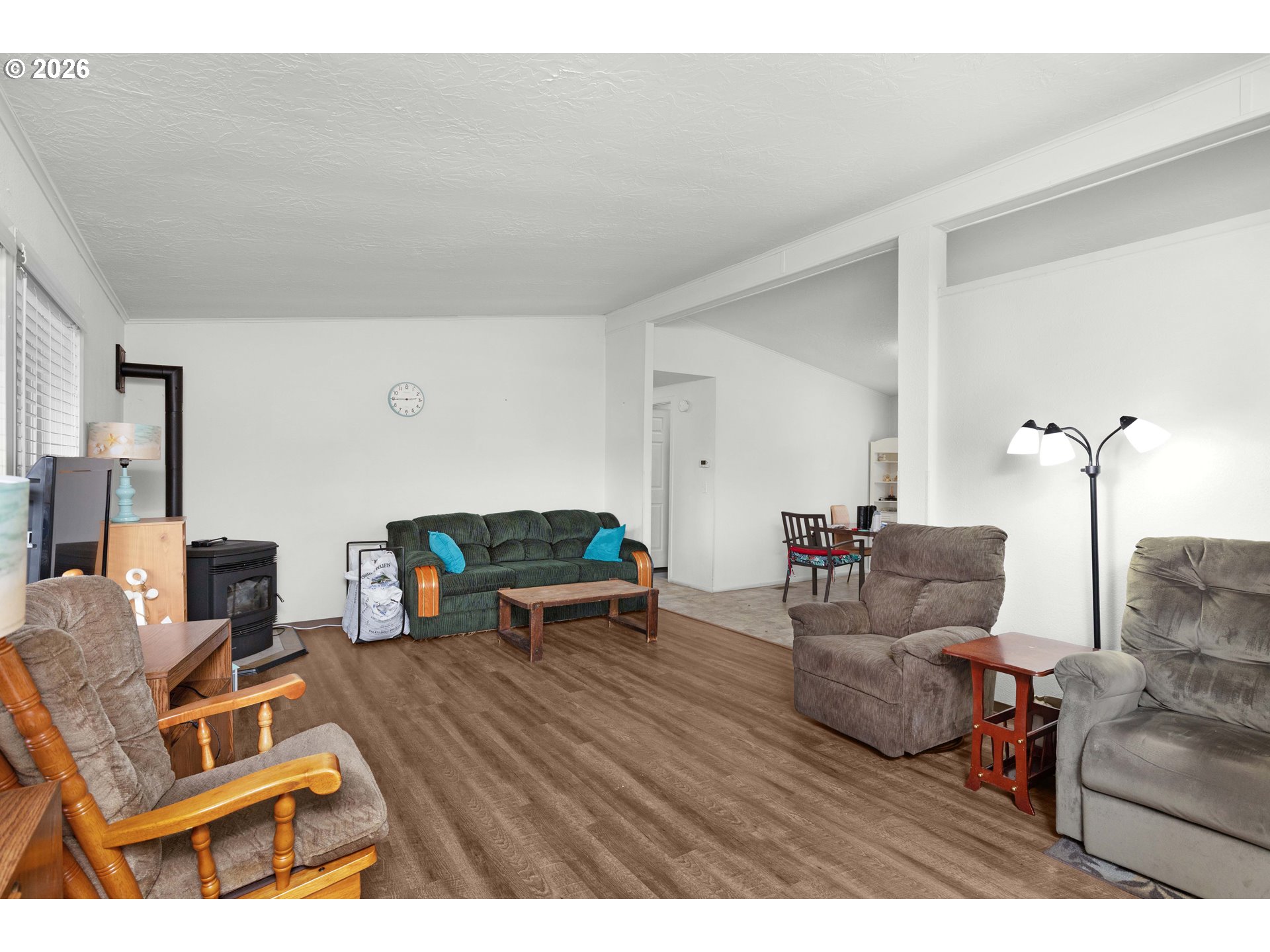 583 Suncrest Street Myrtle Creek, OR 97457 - Photo 7 of 24 a living room with furniture and a wooden floor