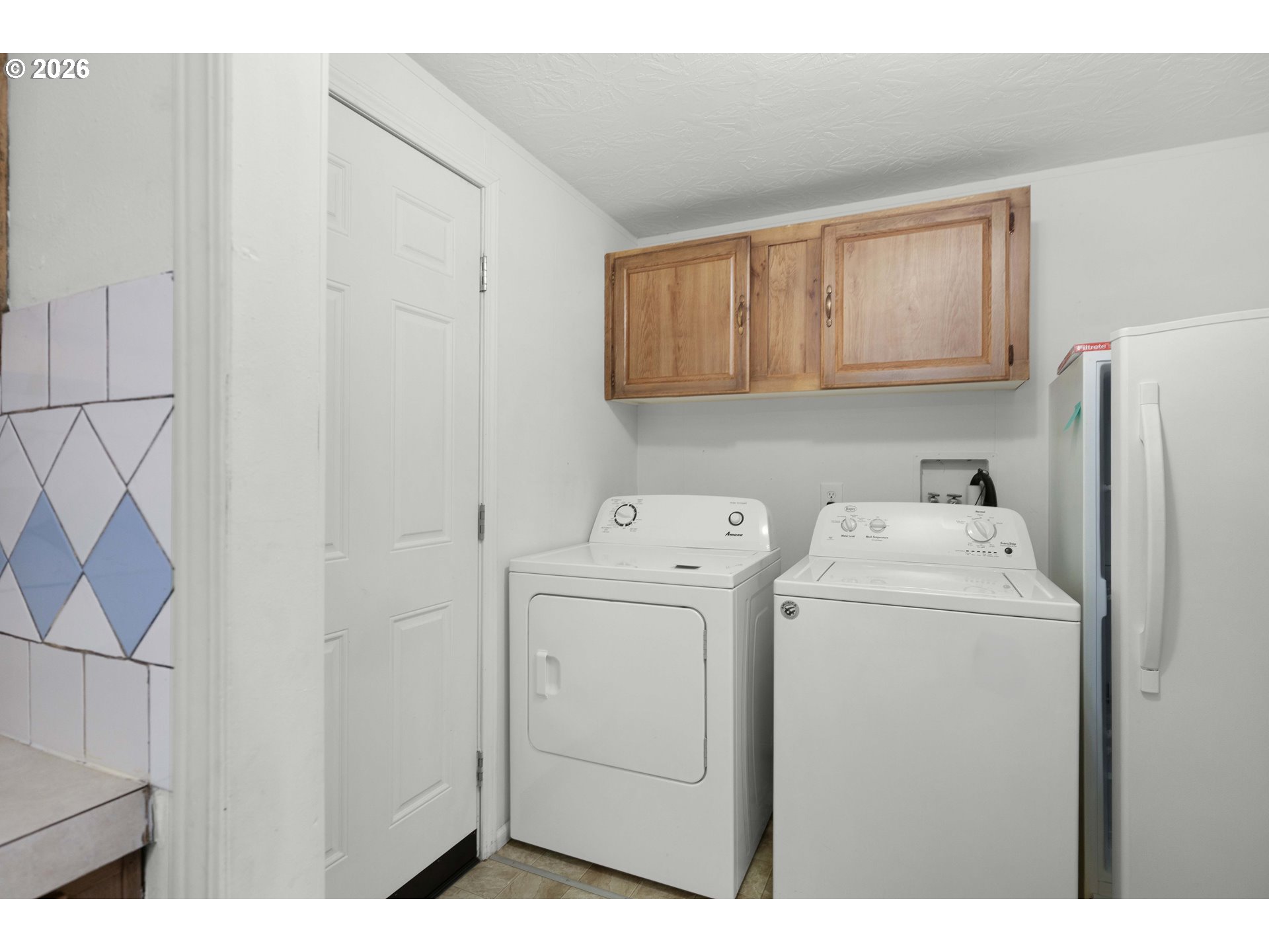 583 Suncrest Street Myrtle Creek, OR 97457 - Photo 10 of 24 a utility room with dryer and washer
