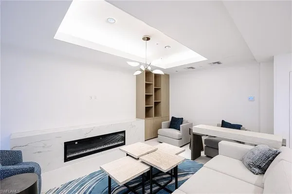 a living room with furniture and a couch