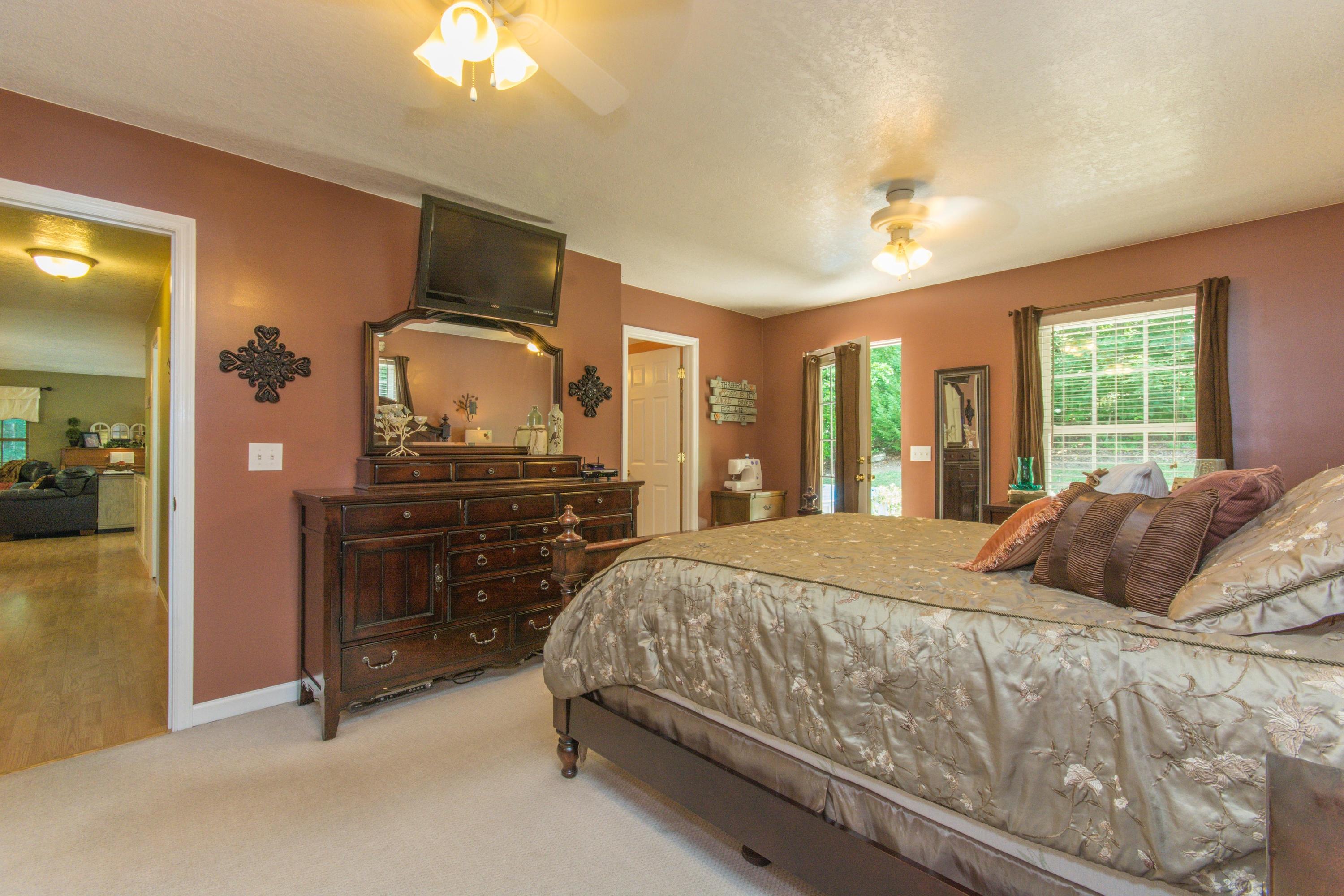 11930 Thatch Road Harrison, TN 37341 - Photo 12 of 38 Main Bedroom leading out to Morning Porc