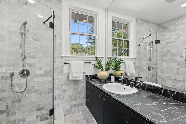 a large kitchen with a stove and a sink