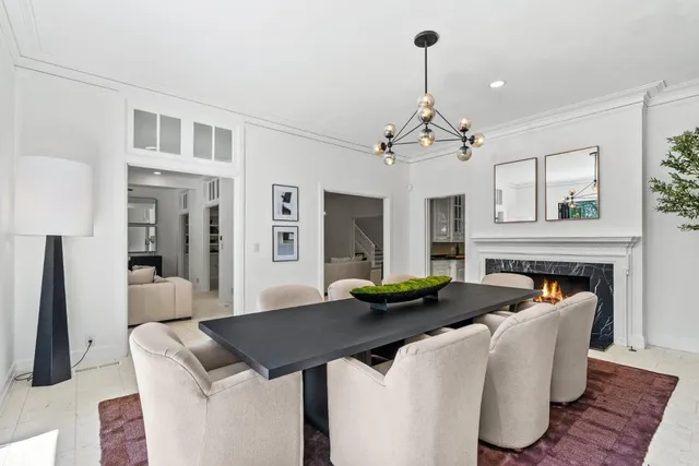 a kitchen with stainless steel appliances a sink stove and cabinets