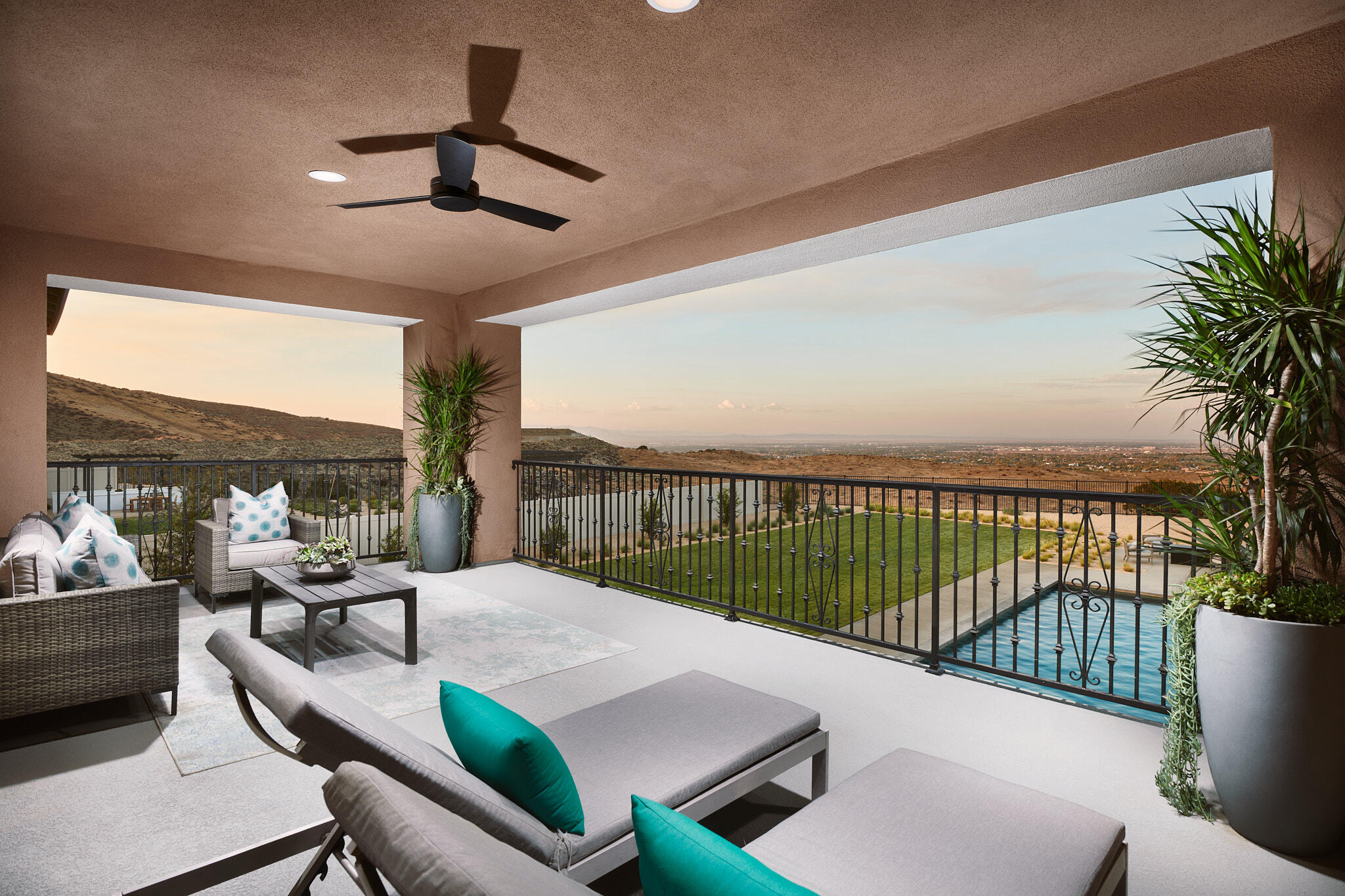 39633 Rula Drive Palmdale, CA 93551 - Photo 4 of 5 a balcony with furniture and a floor to ceiling window