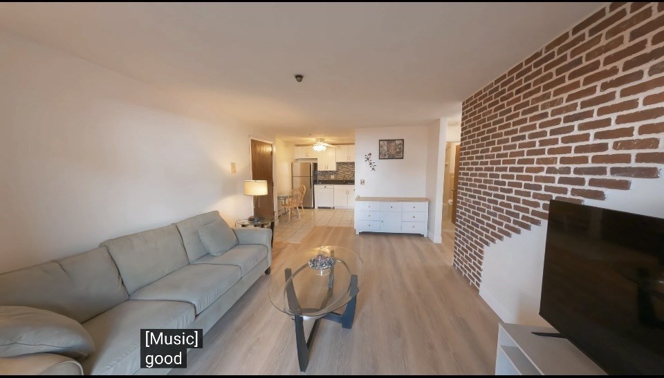 141 Pierce Street, Unit 12 Malden, MA 02148 - Photo 1 of 15 a living room with furniture and a flat screen tv