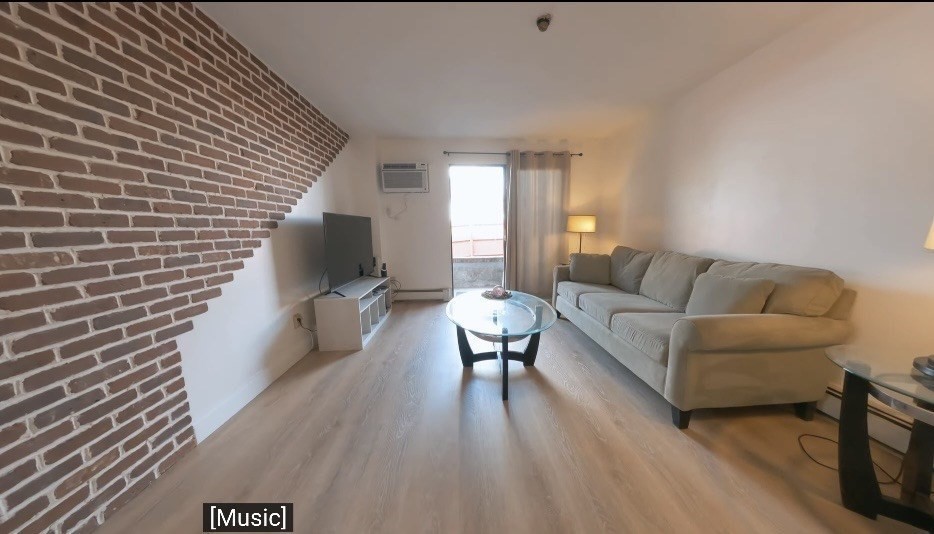 141 Pierce Street, Unit 12 Malden, MA 02148 - Photo 3 of 15 a living room with furniture and a wooden floor