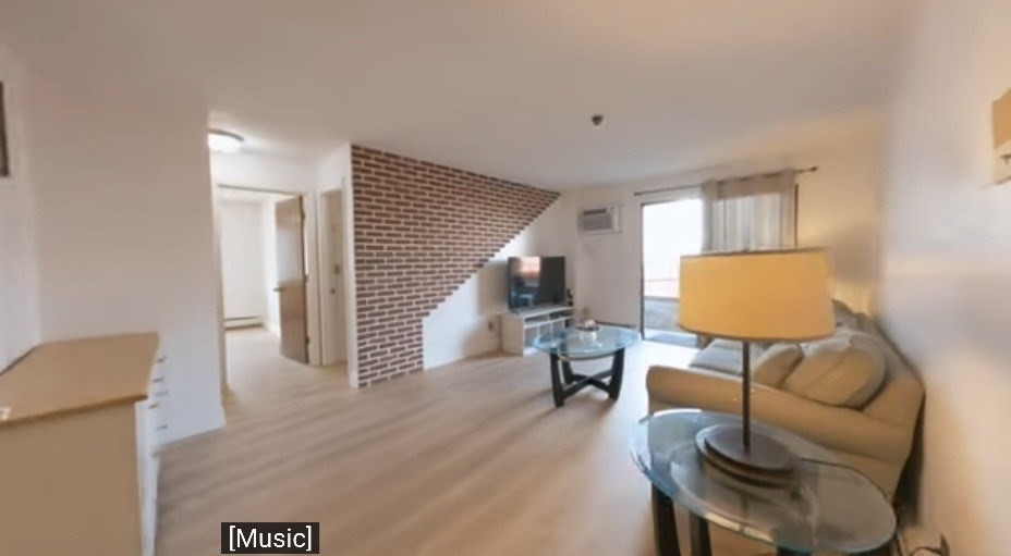141 Pierce Street, Unit 12 Malden, MA 02148 - Photo 6 of 15 a living room with furniture and a lamp