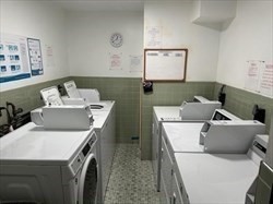 141 Pierce Street, Unit 12 Malden, MA 02148 - Photo 9 of 15 a utility room with dryer and washer