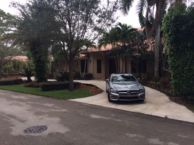 384 Northwest 9th Terrace Boca Raton, FL 33486 - Photo 1 of 16 front